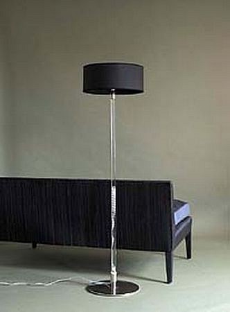 Ochre, Axis Mundi floor lamps (2)
2005, polished nickel base, solid clear glass rod and twisted silk flex